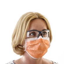 Woman wearing Komfort safety goggles as example of use