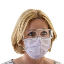 Woman wearing safety goggles/”over the glass” safety goggles as demonstration