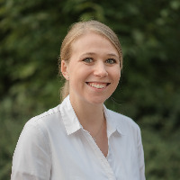 Photo of our CEO Jessie Ilsen against a green background