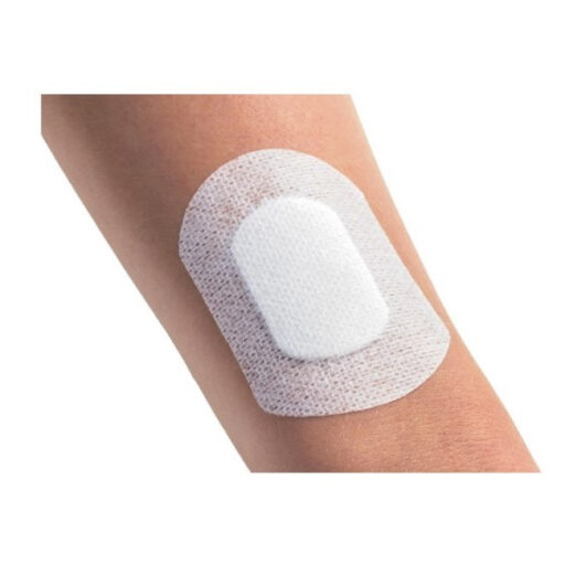 weißes Wundpflaster Drop auf dem Arm angebracht